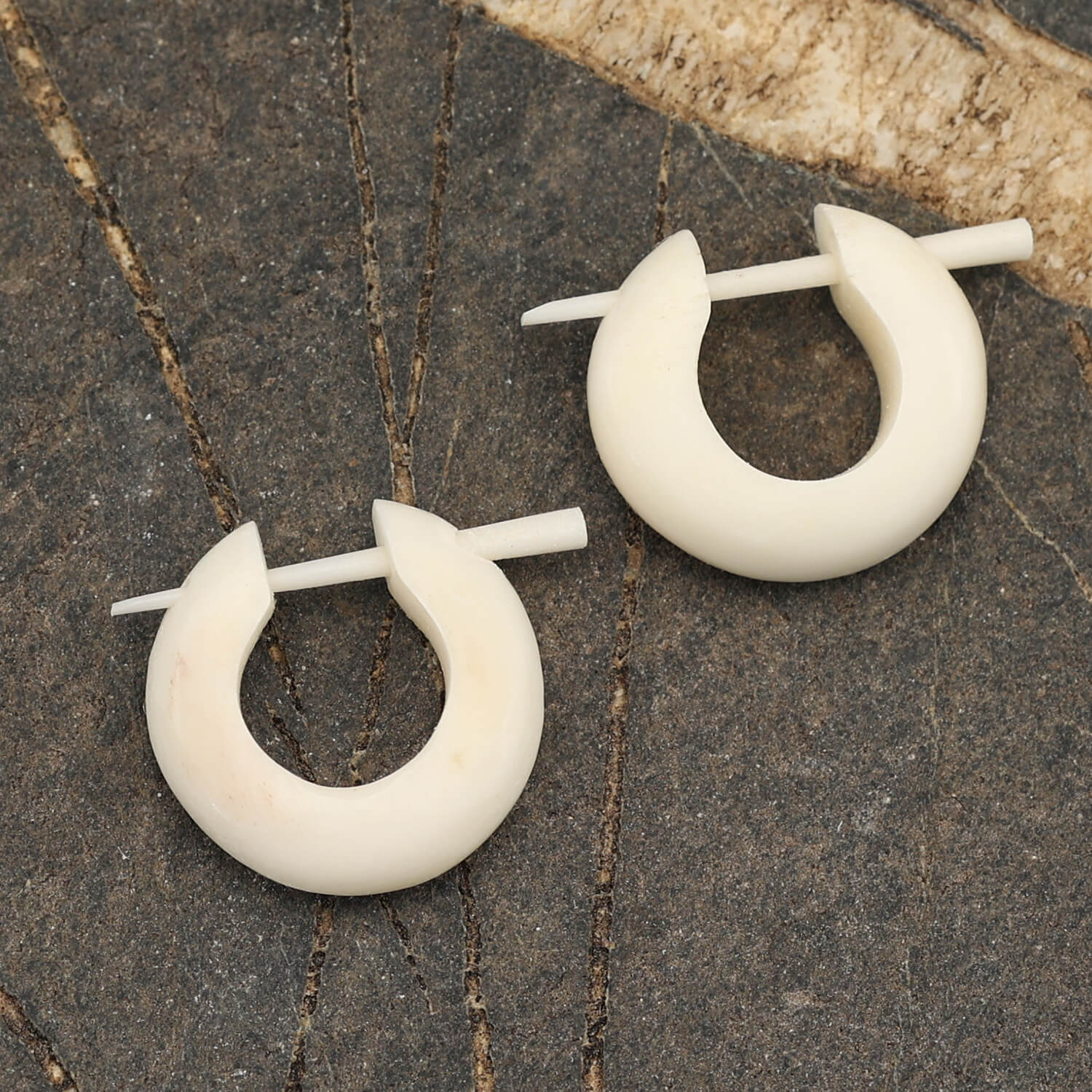 Creole earrings carved from bone