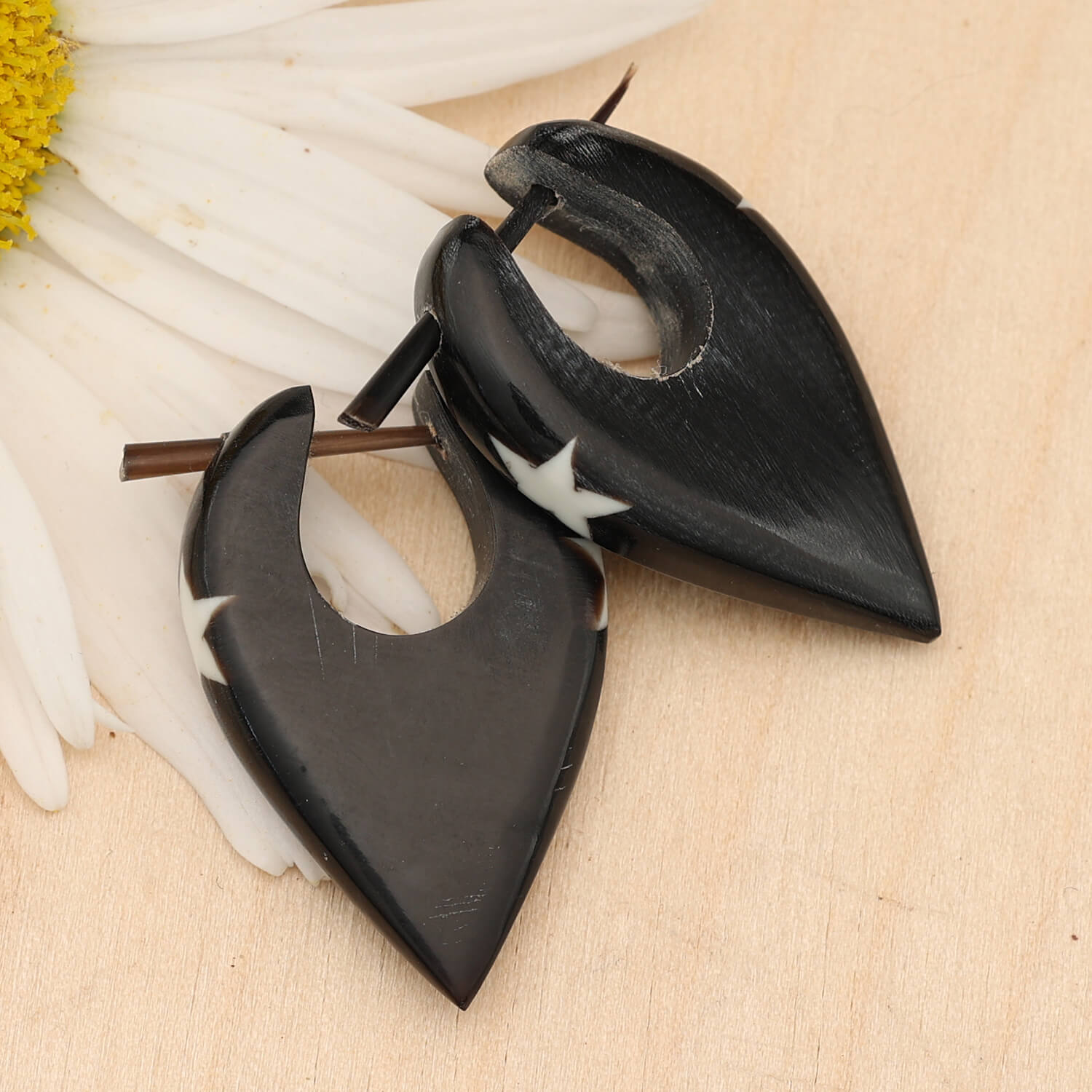 Creole star earrings, carved from horn