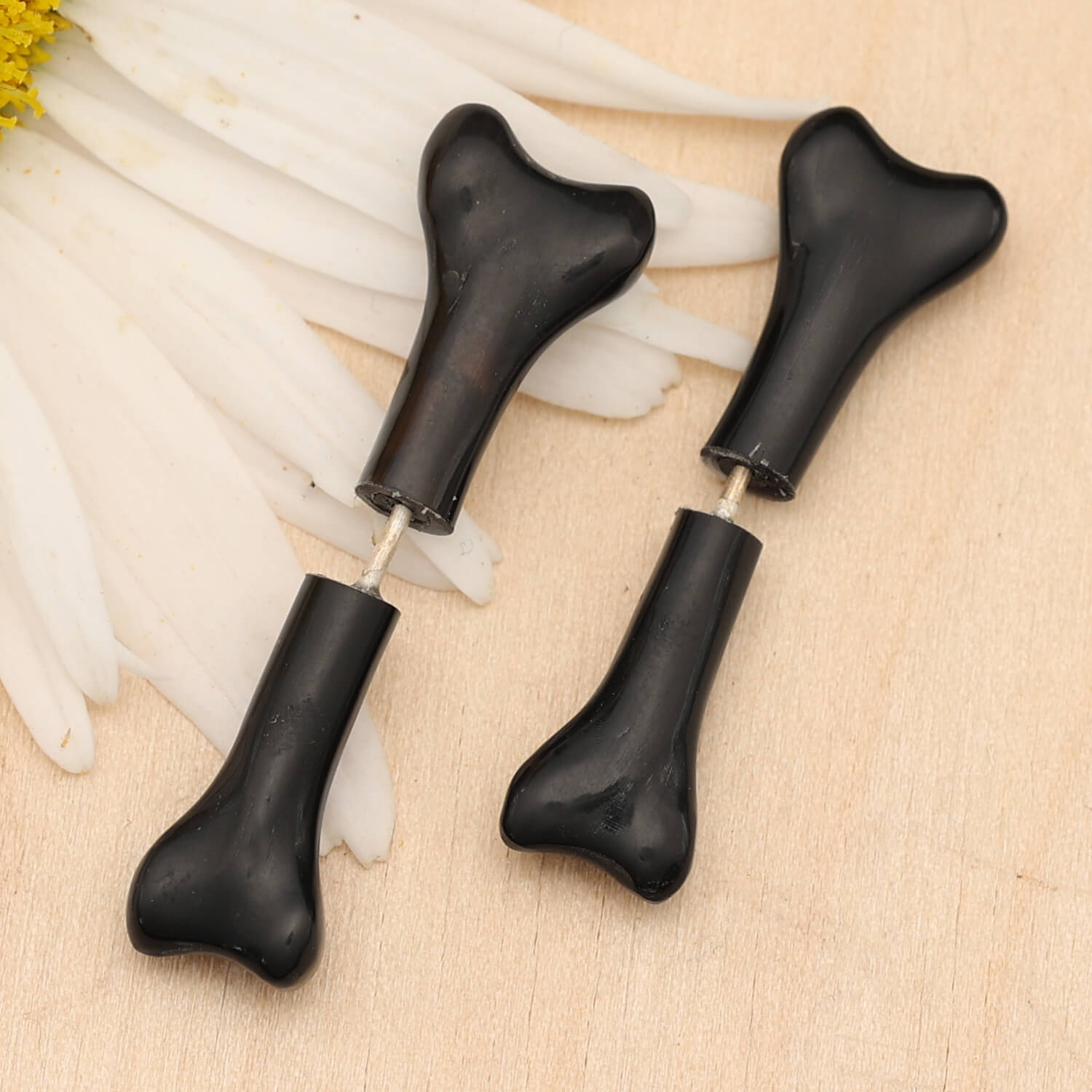 Fake bone piercing made of horn