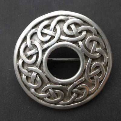 Silver brooches